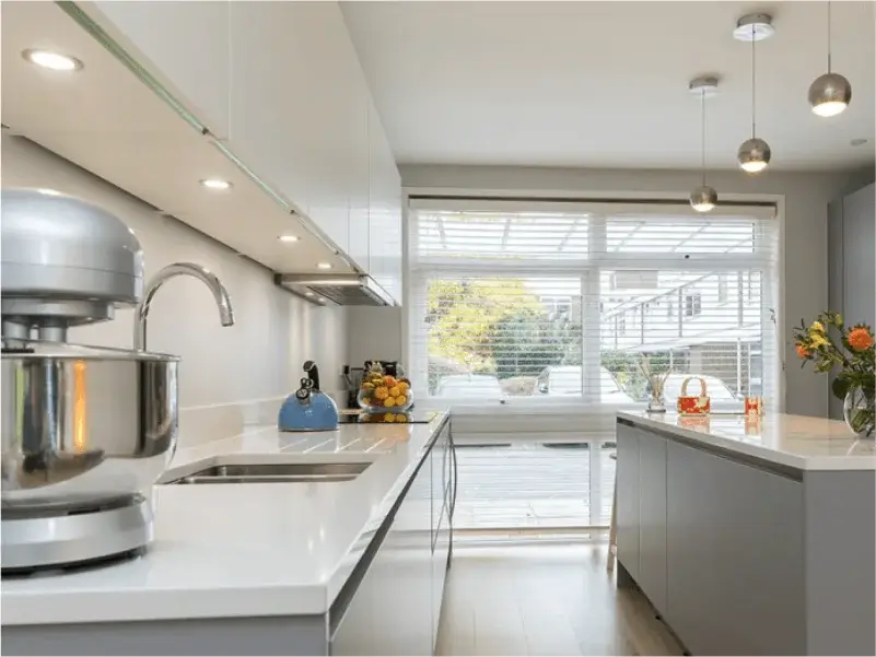 Lighting Upgrades – Expert Electricians in Bath Modern kitchen lighting installation with LED cabinet lights and pendant fittings by Peaks Electrical in Bath.